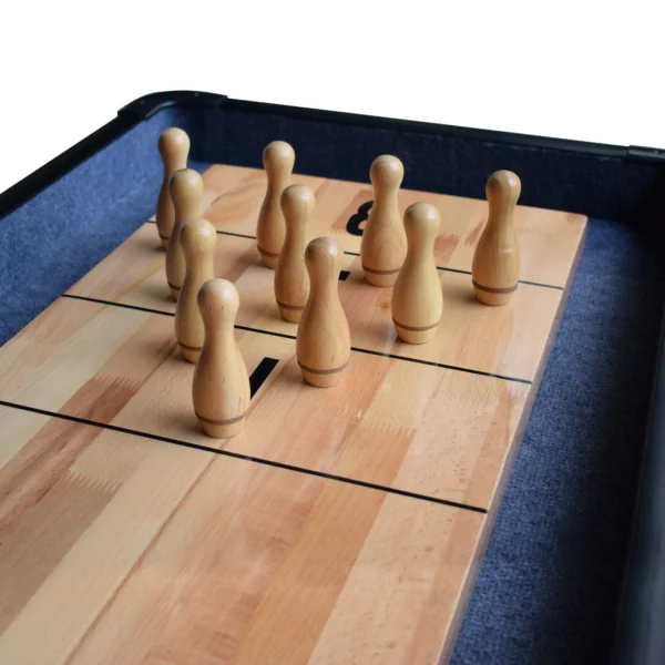 Shuffleboard Bowling Pin Set on a wooden board.