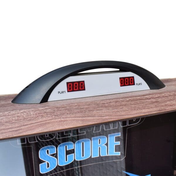 A Shooting Star 9-ft Roll Hop and Score Arcade Game Table with LED Scoring with a scoreboard attached to it.