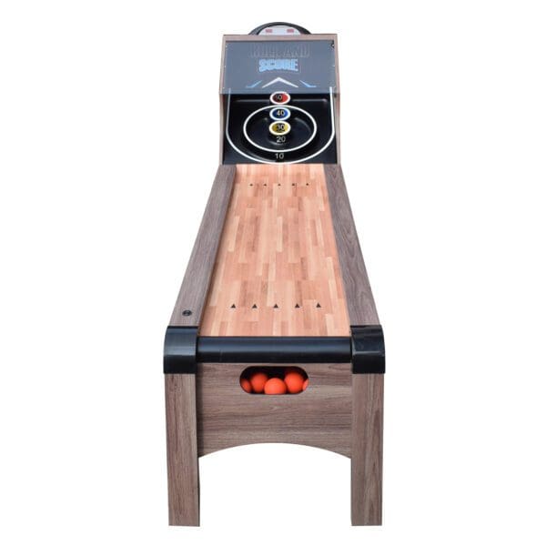 A Shooting Star 9-ft Roll Hop and Score Arcade Game Table with LED Scoring with a bowling ball on it.