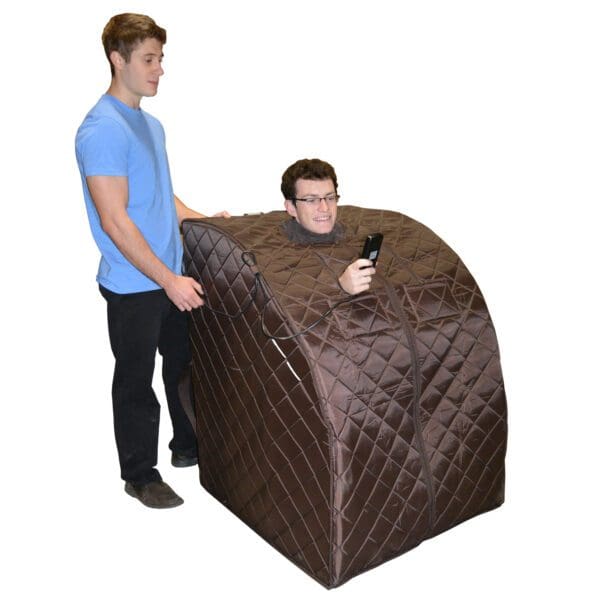 A man instructing the man sitting in sauna