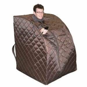 A Man Sitting in a Harmony Deluxe Oversized Portable Sauna