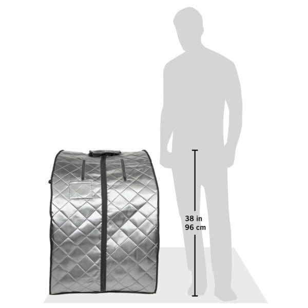 A man is standing next to a Rejuvenator Portable Sauna.