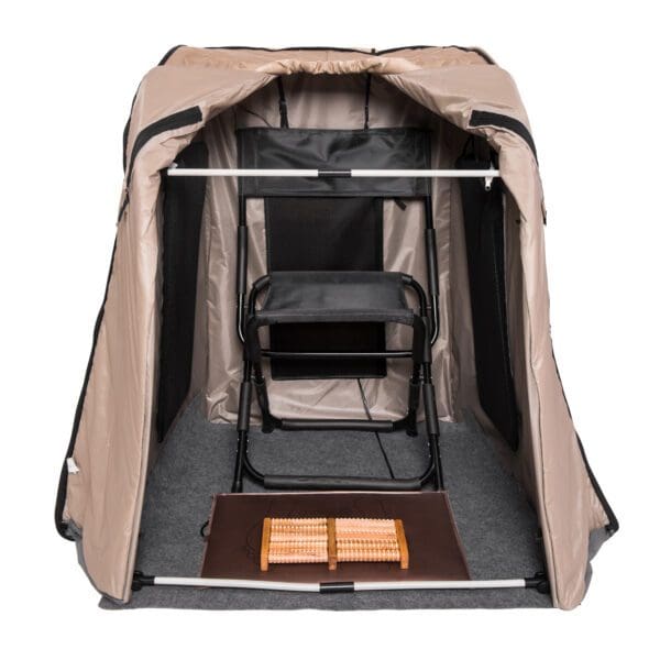 A Valerian Portable Sauna with a chair inside.