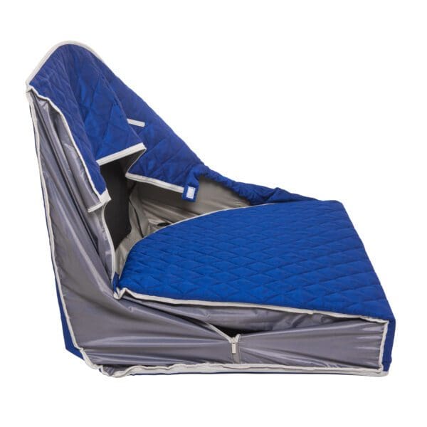 A blue quilted Liberty Portable Sauna seat cover with a zipper.