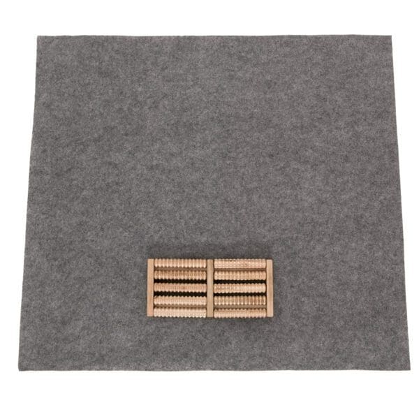 A Liberty Portable Sauna on a gray felt mat.