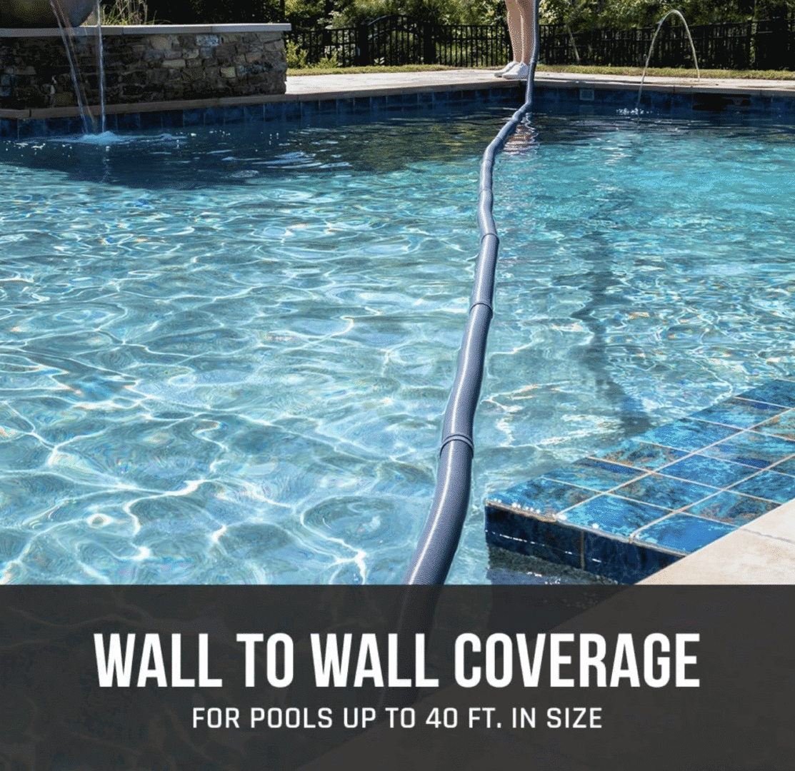 Pool vacuum in action with hose.